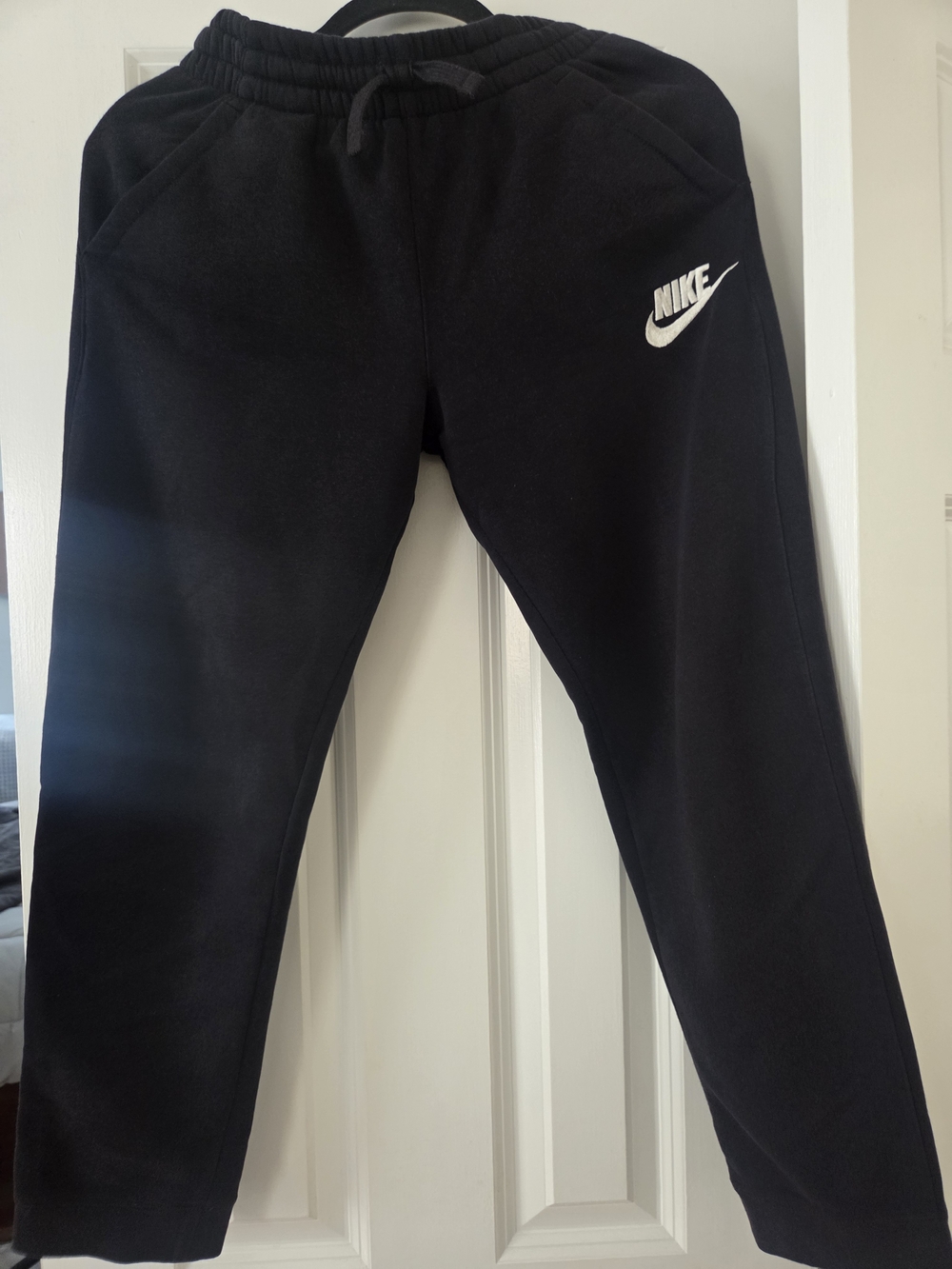 Nike Black Kids Jogger Pants with White Swoosh